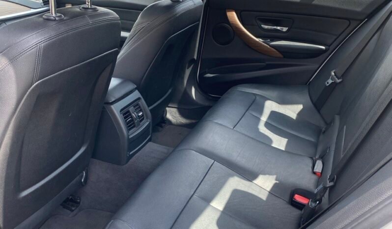 
								2015 BMW 320i xDrive full									
