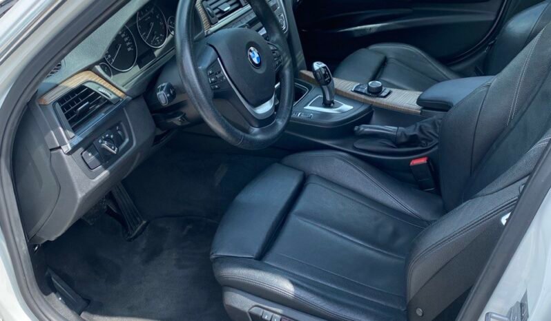 
								2015 BMW 320i xDrive full									