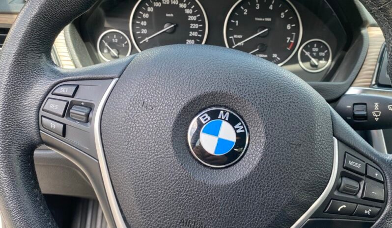 
								2015 BMW 320i xDrive full									